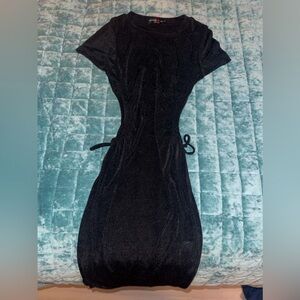 Brand: Absolutely Heart It!!/ Size:Small/ cutouts on the side with bows/ Black